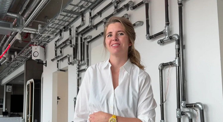 woman standing in a high tech co-working space